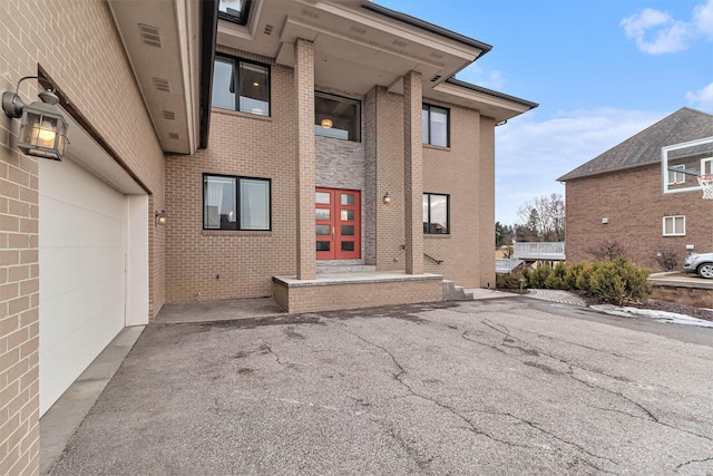 entrance to property with brick siding