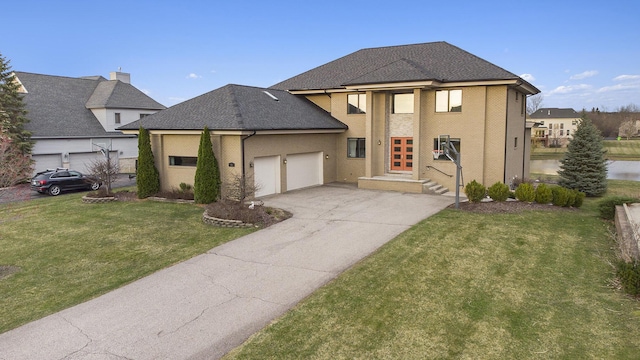 view of front of house with a garage, a front lawn, and concrete driveway