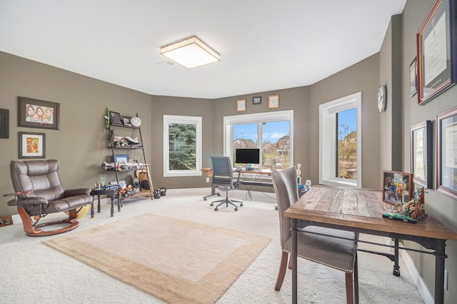 view of carpeted office space