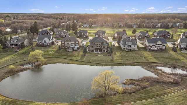 bird's eye view with a residential view and a water view