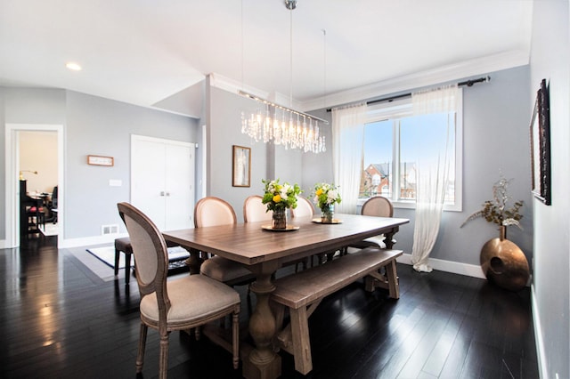 dining area with baseboards, a notable chandelier, ornamental molding, recessed lighting, and dark wood-type flooring