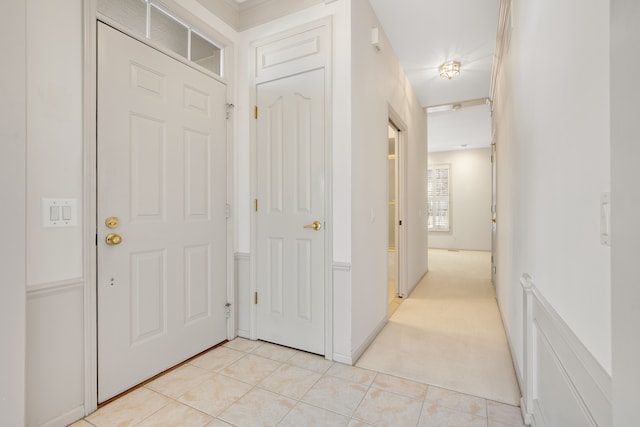 entryway featuring light tile patterned floors