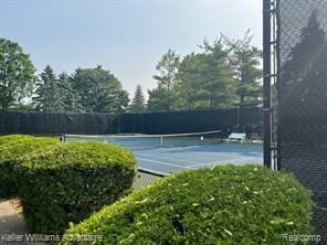 view of sport court with fence