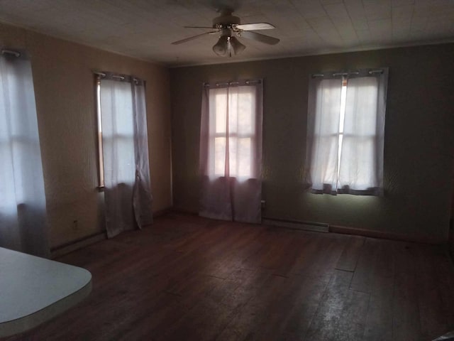 unfurnished room featuring crown molding, a ceiling fan, and hardwood / wood-style flooring