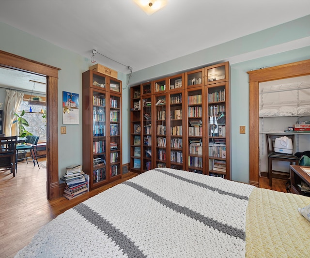 bedroom featuring wood finished floors