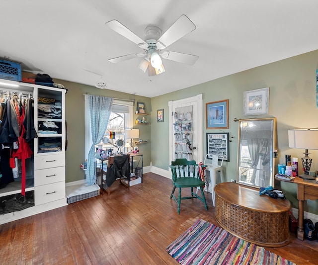 office featuring hardwood / wood-style flooring, baseboards, and ceiling fan