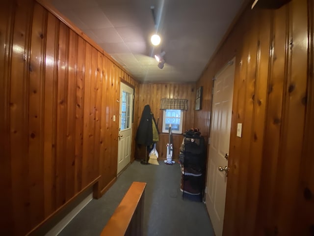 interior space featuring wooden walls