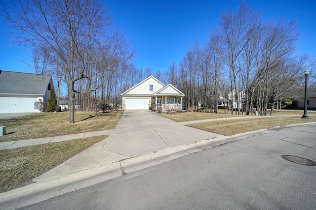 view of front of home with a garage, covered porch, concrete driveway, and a front lawn