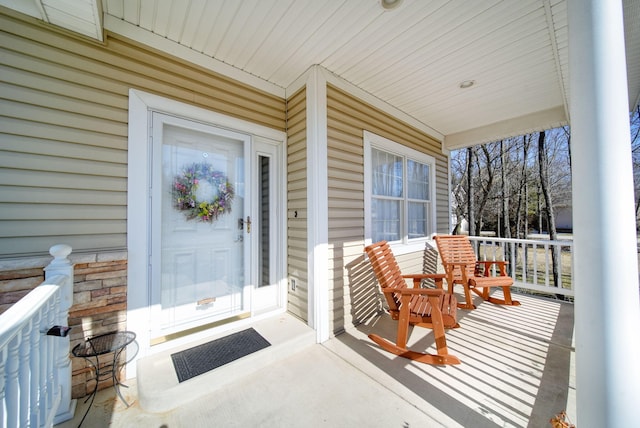 entrance to property with covered porch