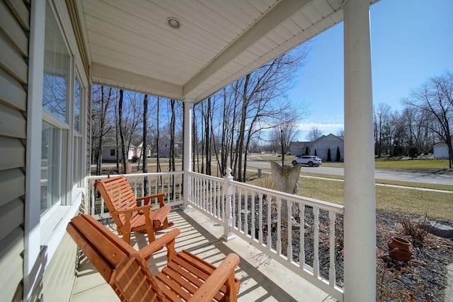 balcony featuring covered porch