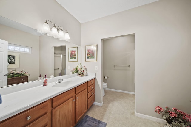 full bath featuring baseboards, toilet, tile patterned floors, an enclosed shower, and vanity