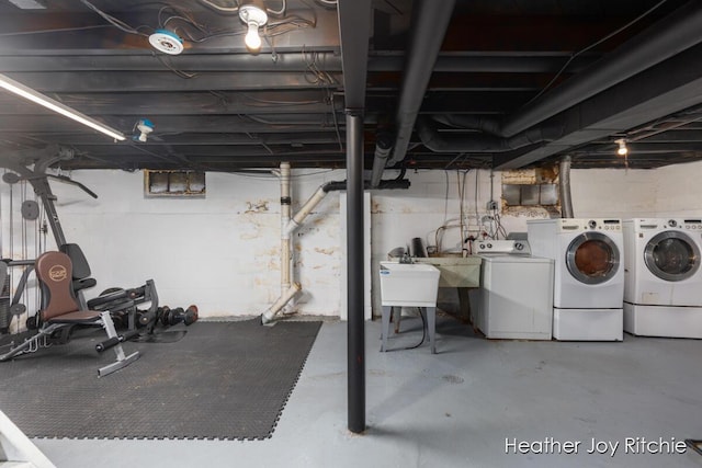 unfinished basement featuring independent washer and dryer