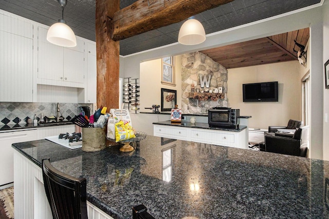 kitchen with backsplash, white cabinets, white dishwasher, wood ceiling, and hanging light fixtures