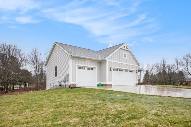 view of side of property with driveway, a shingled roof, a water view, a lawn, and board and batten siding