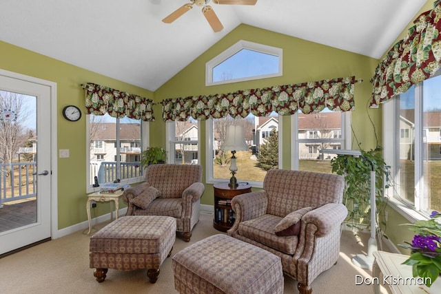 sunroom / solarium featuring a ceiling fan and vaulted ceiling