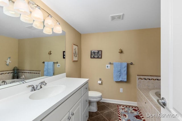 full bath with tile patterned flooring, a garden tub, vanity, and visible vents