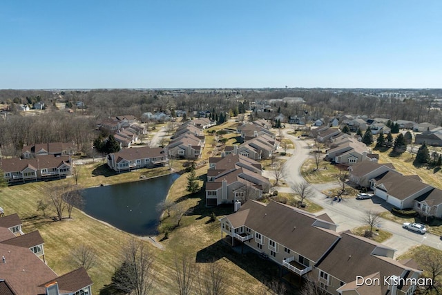 birds eye view of property featuring a residential view and a water view