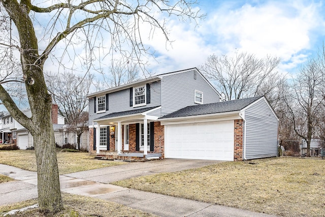 traditional-style home featuring fence, a porch, concrete driveway, a garage, and brick siding