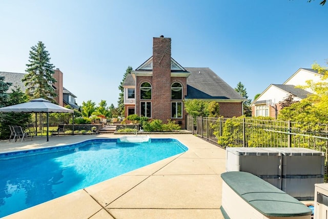 view of pool with a fenced in pool, a patio area, and fence