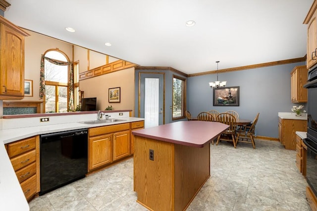 kitchen featuring an inviting chandelier, a sink, hanging light fixtures, dishwasher, and a center island