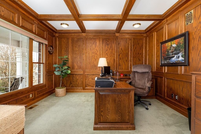 office space with beam ceiling, wood walls, coffered ceiling, and light carpet