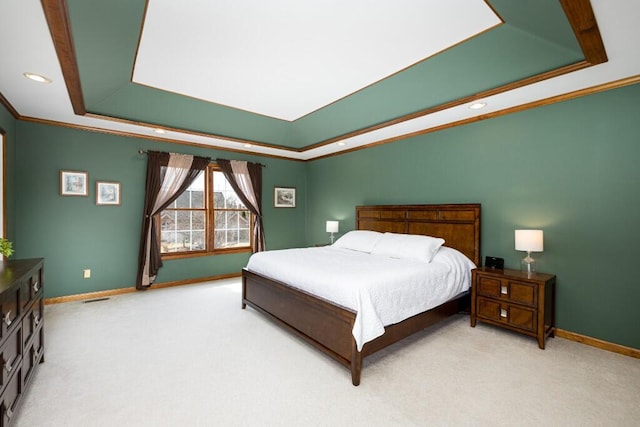 bedroom featuring a raised ceiling, light colored carpet, and crown molding