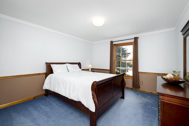 carpeted bedroom featuring baseboards and ornamental molding