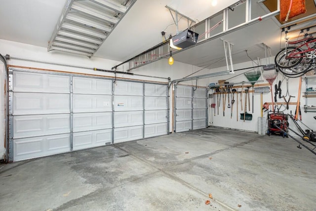 garage featuring a garage door opener