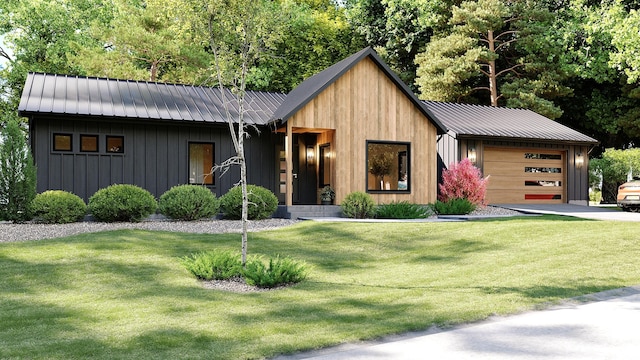 view of front facade with metal roof, a front yard, and an attached garage