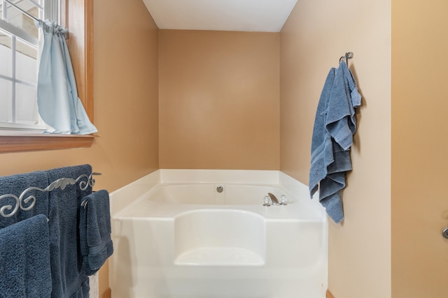 full bathroom featuring a garden tub