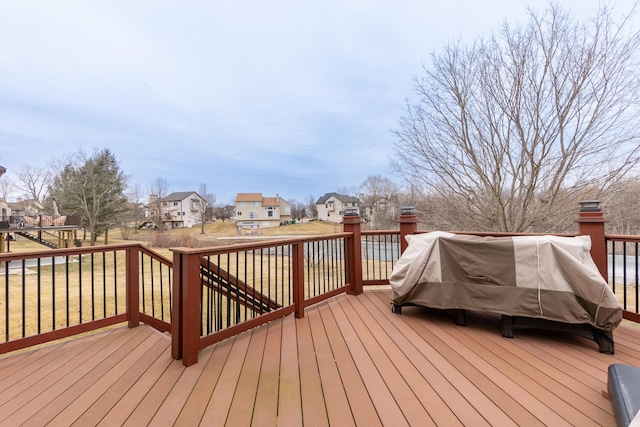 wooden deck with a residential view