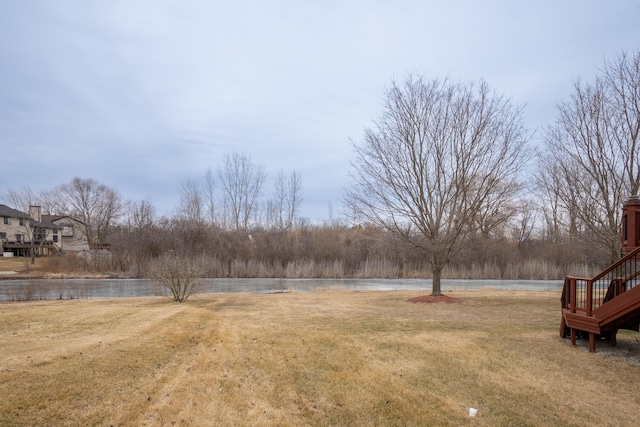 view of yard with a water view