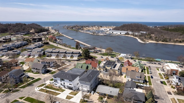 aerial view featuring a residential view and a water view