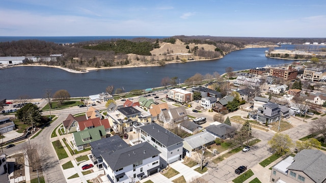 birds eye view of property featuring a water view