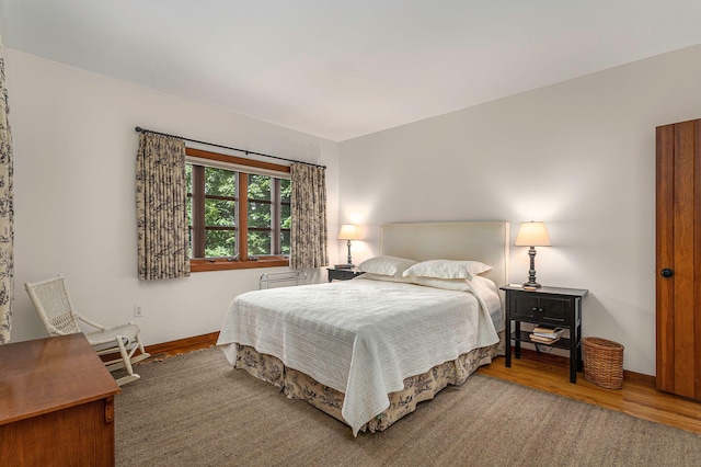 14598 Lakeshore Rd, Lakeside, MI 49116 - bedroom with baseboards and wood finished floors