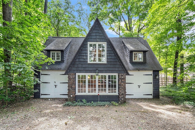 14598 Lakeshore Rd, Lakeside, MI 49116 - back of house with stone siding and a shingled roof