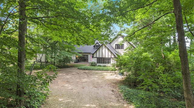 14598 Lakeshore Rd, Lakeside, MI 49116 - tudor house featuring stucco siding and roof with shingles