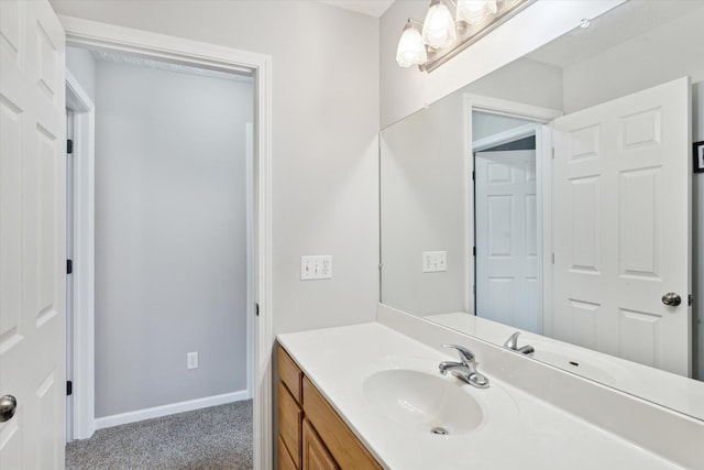 bathroom featuring vanity and baseboards