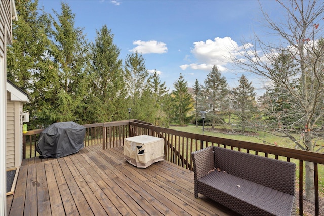 wooden deck with area for grilling