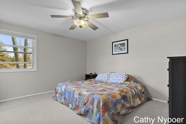 bedroom featuring carpet flooring, ceiling fan, and baseboards