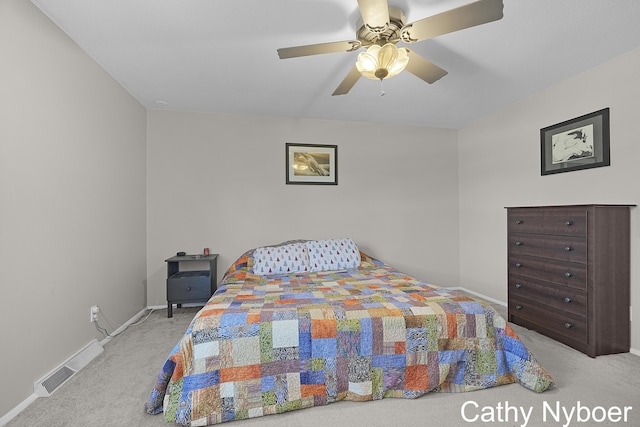 bedroom featuring ceiling fan, carpet, visible vents, and baseboards