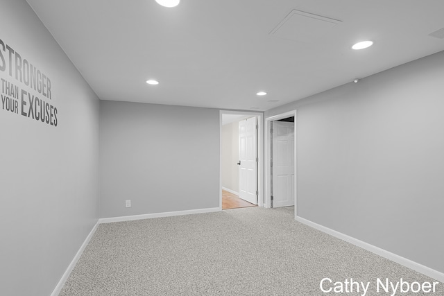 below grade area featuring recessed lighting, baseboards, and carpet floors