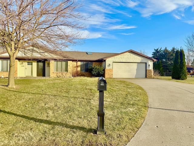 ranch-style home featuring concrete driveway, brick siding, a garage, and a front yard