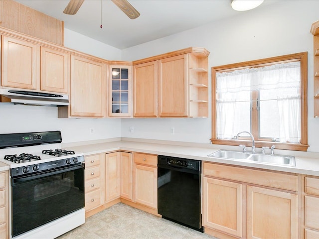 kitchen featuring light brown cabinetry, gas range, under cabinet range hood, and black dishwasher