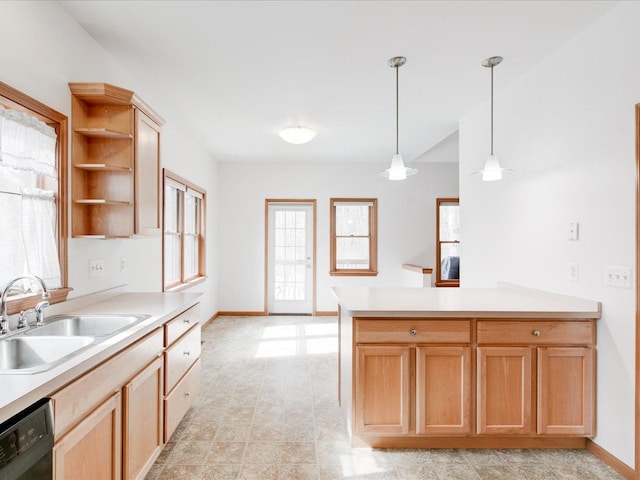 kitchen with a sink, open shelves, black dishwasher, a peninsula, and light countertops