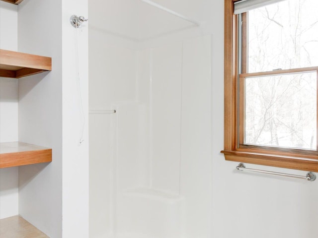 bathroom with a shower