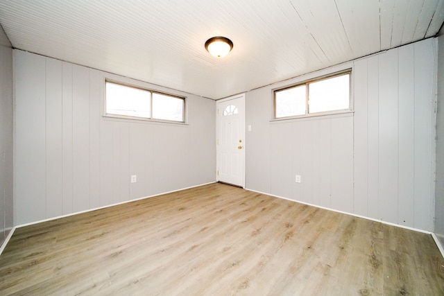 spare room with wood finished floors