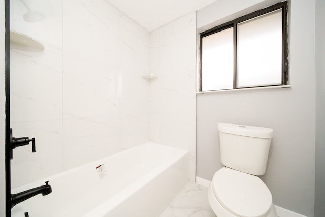 bathroom featuring baseboards, toilet, and marble finish floor