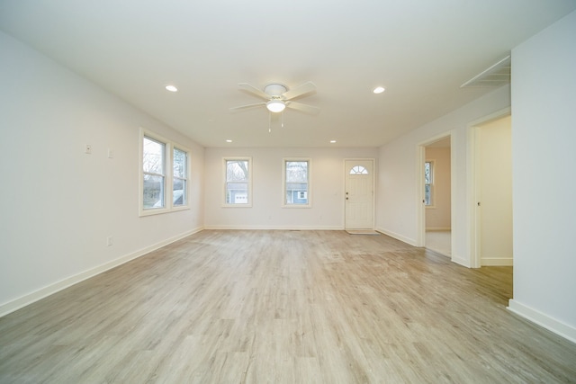 unfurnished living room with recessed lighting, light wood-type flooring, baseboards, and ceiling fan