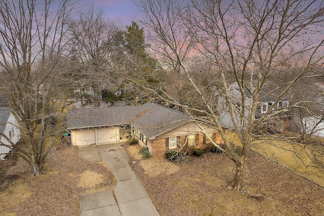 view of front of house with concrete driveway